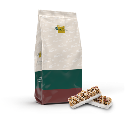 Sacchetto Master Martini con etichetta verde e rossa accanto a due barrette granola con cioccolato bianco