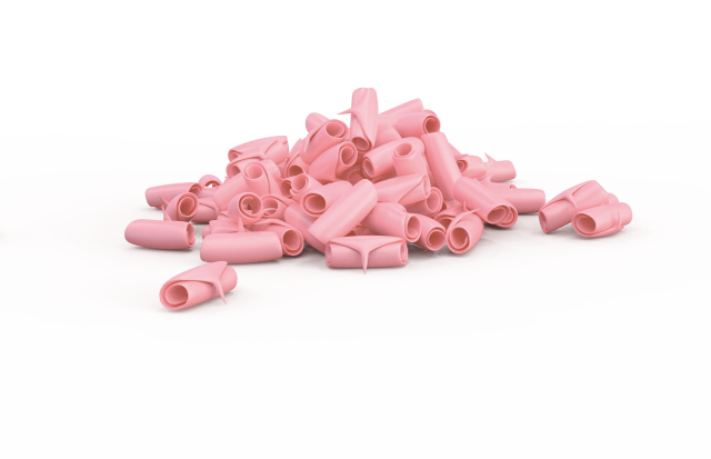 Cumulo di gomme da masticare rosa a forma di tubo su sfondo bianco